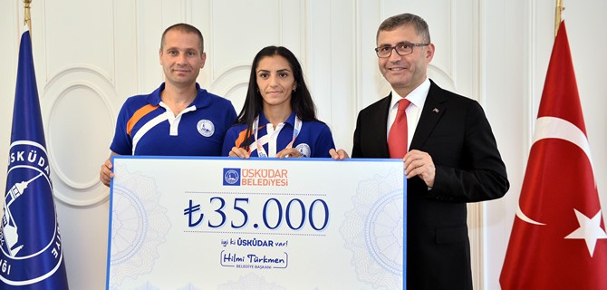 Hilmi Türkmen'den Avrupa 3.'sü Özlem Kaya'ya 35 bin lira para ödülü